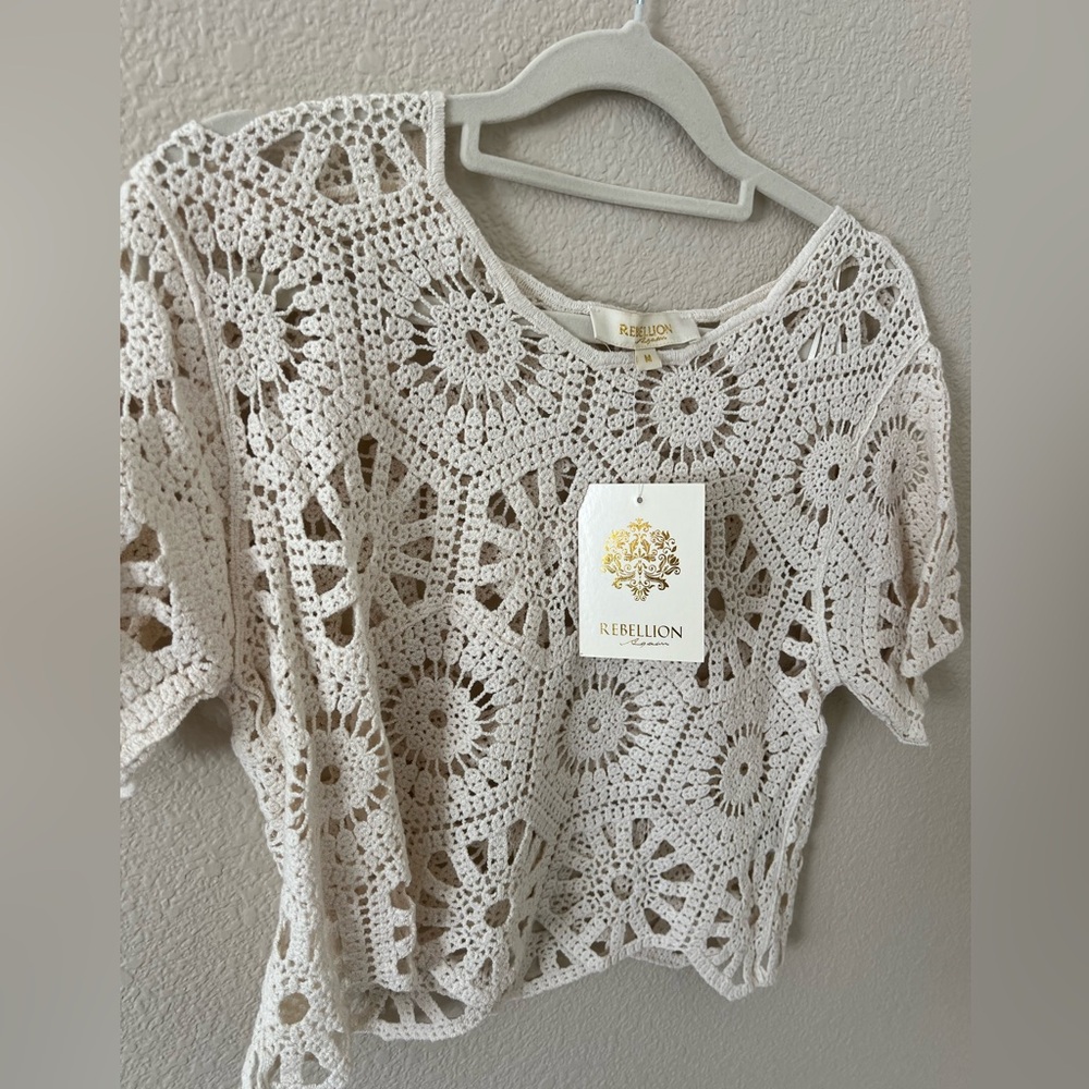 Crocheted cream colored blouse